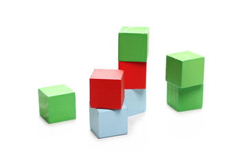 Obraz premium Wooden building blocks for children, isolated on white background 