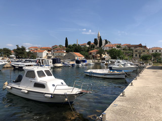 Fototapeta na wymiar Boats in the harbor of the town Kali