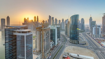 Obraz premium Dubai business bay towers at sunset aerial timelapse.