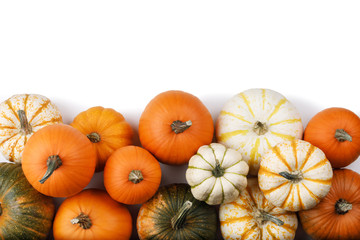 Many Pumpkins on white