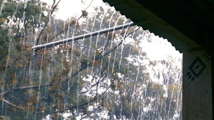 Heavy Rain Falling From the Roof of a House.