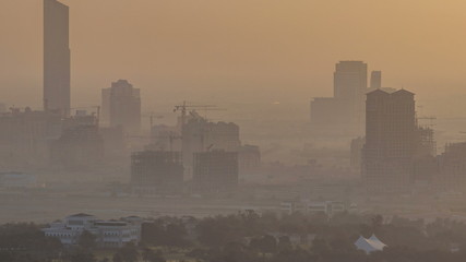 Aerial view to Festival city district timelapse with construction site