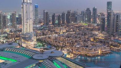 Fototapeta na wymiar Dubai downtown day to night timelapse. Top view from above