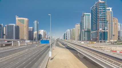 Fototapeta premium Amazing view on Sheikh Zayed road surrounded Dubai Marina and JLT skyscrapers