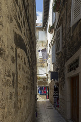 A narrow medieval street in Trogir in Croatia