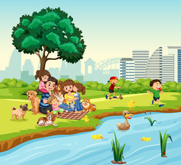 Obraz na płótnie Canvas Family picnic next to duck pond