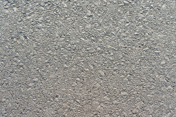 Grey asphalt texture (background).
