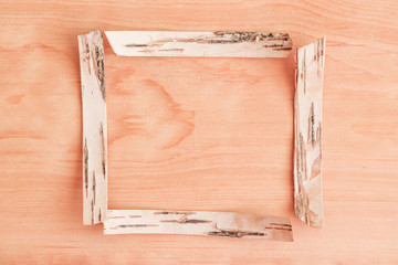 Natural birch bark frame, on birch wood, mock up background with blank space for text
