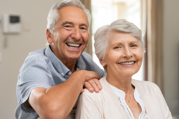 Happy senior couple smiling