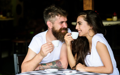 Couple in love drink black espresso coffee in cafe. Pleasant coffee break. Drinking black coffee has numerous health benefits loaded with antioxidants and nutrients. Couple enjoy hot espresso