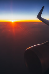 Beautiful sunset. Aerial view from airplane window