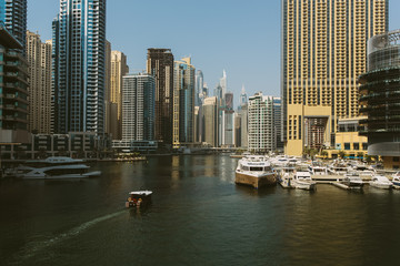 Fototapeta na wymiar Marina Promenade in Dubai city, UAE, United Arab Emirates. Clear blue sky at the day