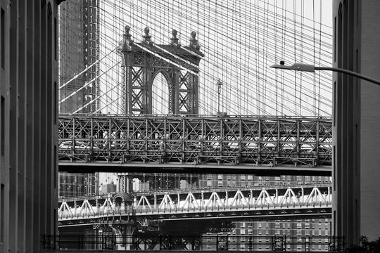 Black and white picture of Brooklyn and Manhattan Bridge in one frame, New York City, USA