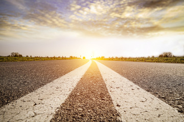 Road view on sunny day. Journey in autumn time.