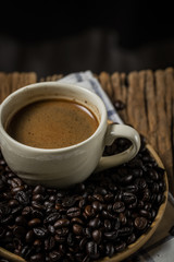 A coffee bean is a seed of the coffee plant and the source for coffee.