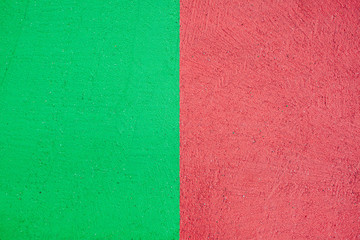 Red and green colored asphalt on street, texture background