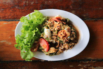 Top view fried chayote leaf crispy spicy salad thai style. Thai yummy and delicious local food.