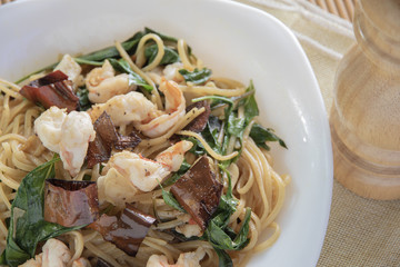 Stir-fried spicy spaghetti shrimp Thai Style.