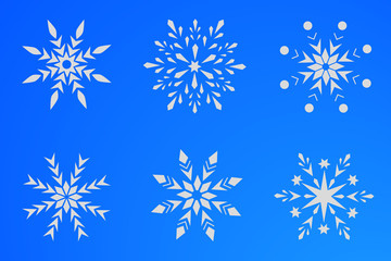 Set of six white snowflakes on a blue background