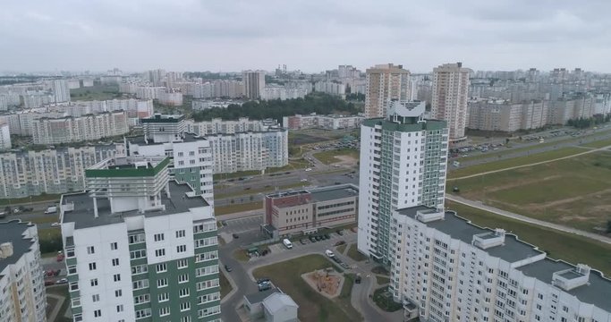 Residential area, flight over residential buildings, urban infrastructure, microdistrict aerial view.