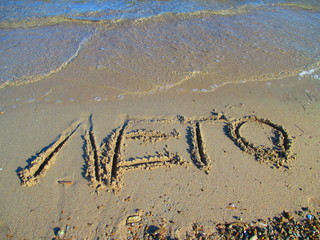 the inscription on the sand.summer sea sand