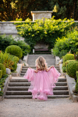 Beautiful girl in amazing dress outdoor. Wedding dress