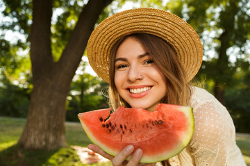 Close up of lovely young girl in summer hat