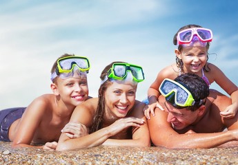 Beautiful Lovely family at sandy beach