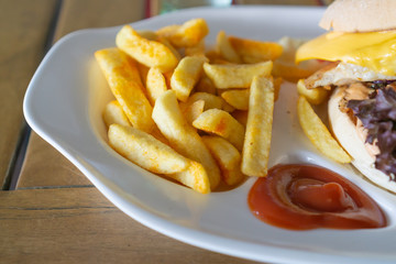 Delicious French fries with ketchup