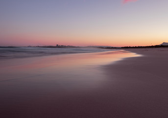 Reflections of the sky on the sea shore. Wollongong, NSW.
