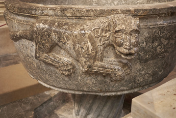 Cefalu, Italy - September 09, 2018: Baptisimal font of the Cathedral of Cefalu