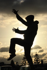 Fototapeta premium silhouette of man on background of white sky