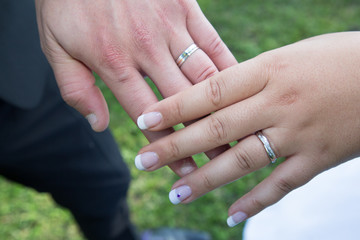 Newly wedding couple hands with wedding rings