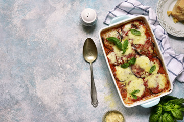 Italian eggplant dish melanzane alla parmigiana.Top view with copy space.