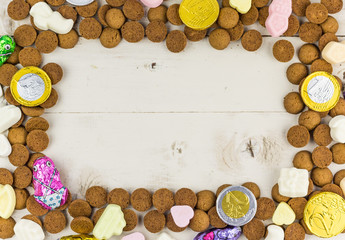 Frame of gingernuts with candy and chocolate coins