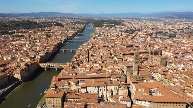 Aerial panoramic view of cityscape of Florence, famous historical city in Italy, Ponte Vecchio (Old Bridge), landscape panorama of Europe from above