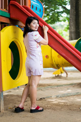 Fototapeta na wymiar portrait woman in playground park