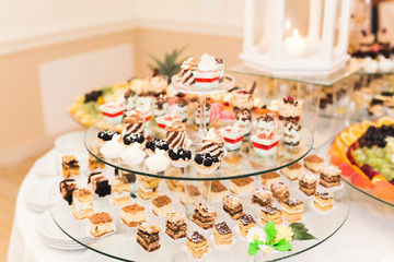 Different kinds of baked sweets on a buffet