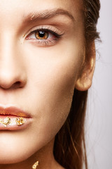 Fototapeta premium Closeup macro beauty portrait of young woman face