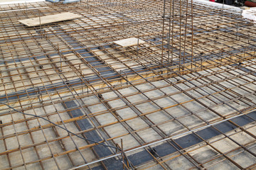 reinforcement of concrete with metal rods connected by wire. 