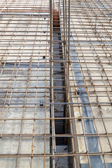 reinforcement of concrete with metal rods connected by wire. Preparation for pouring the slab