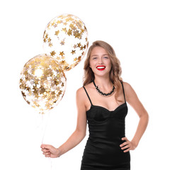 Naklejka premium Beautiful young woman with balloons on white background