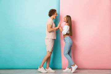 Full length portrait of a happy young couple