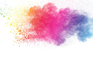 Multicolored powder explosion on white background.