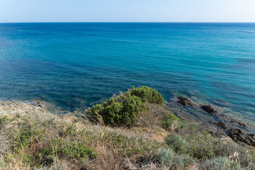Fototapeta na wymiar Beautiful sea and bay on Su Portu beach, Chia, Sardinia island, Italy