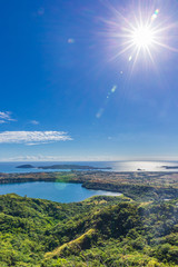 View from Mont Passot above the crater lake Lac Amparihibe and the Indian Ocean, Nosy Be, Madagascar