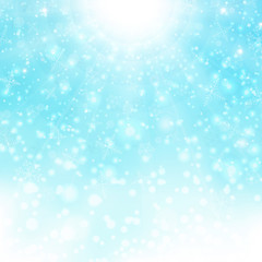 Christmas background of bright snowflake colorful with sun burst on blue sky background.