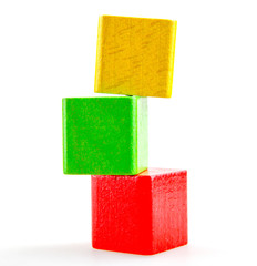 Wooden building blocks isolated on white background.