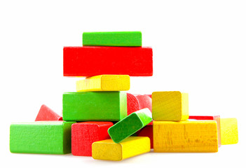 Wooden building blocks isolated on white background.