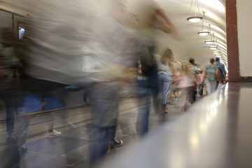 People on the move in the subway as an abstract background